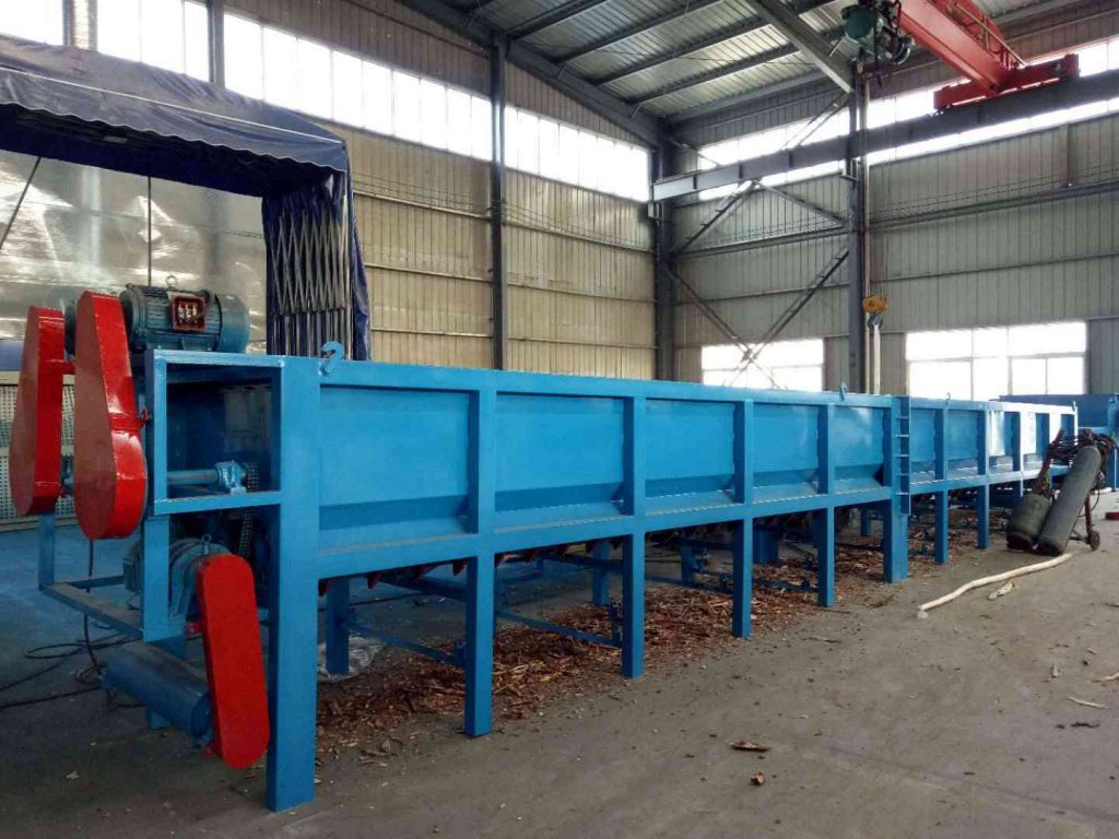 large wood debarker in the wood processing plant
